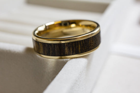Yellow gold wedding ring with wooden inlay manufactured by Nash Jewellery Innovation